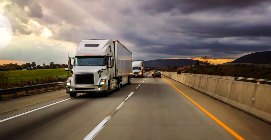 18 wheeler trucks in a row on highway